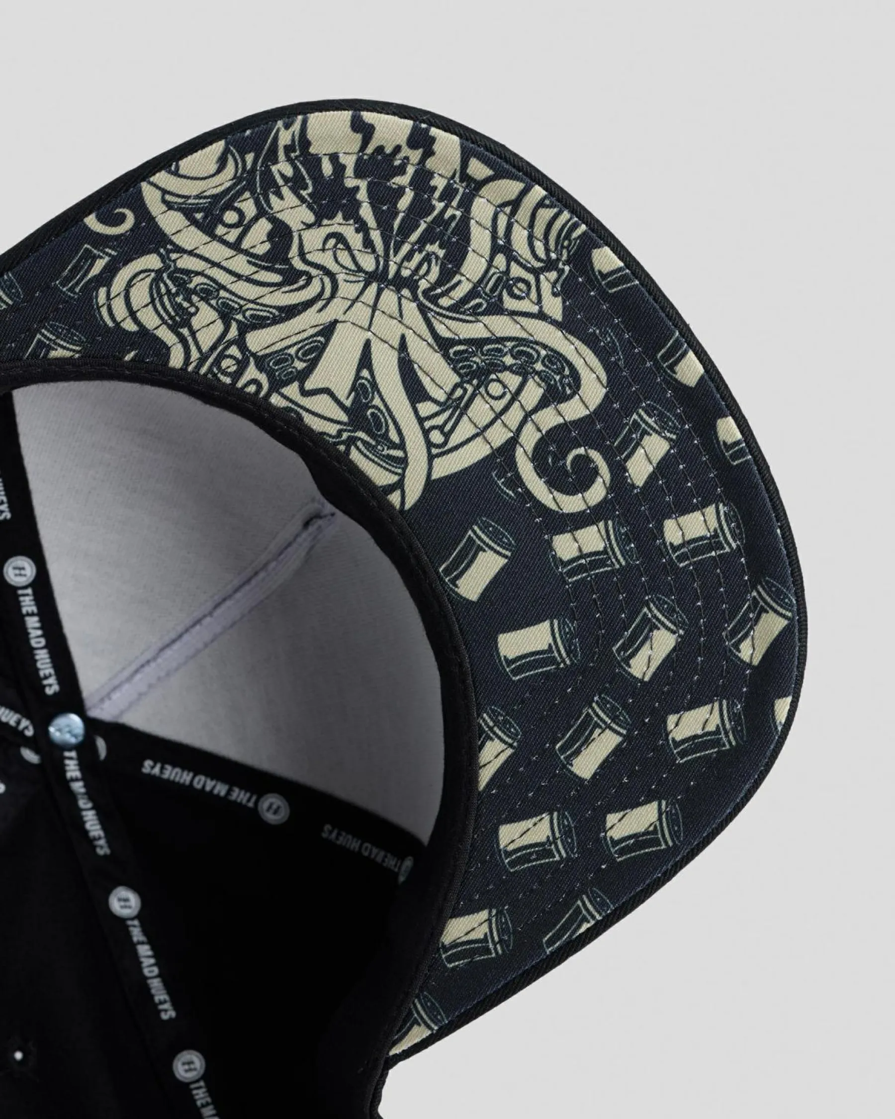 Headwear*The Mad Hueys Kraken Port Hole Snapback Cap Black