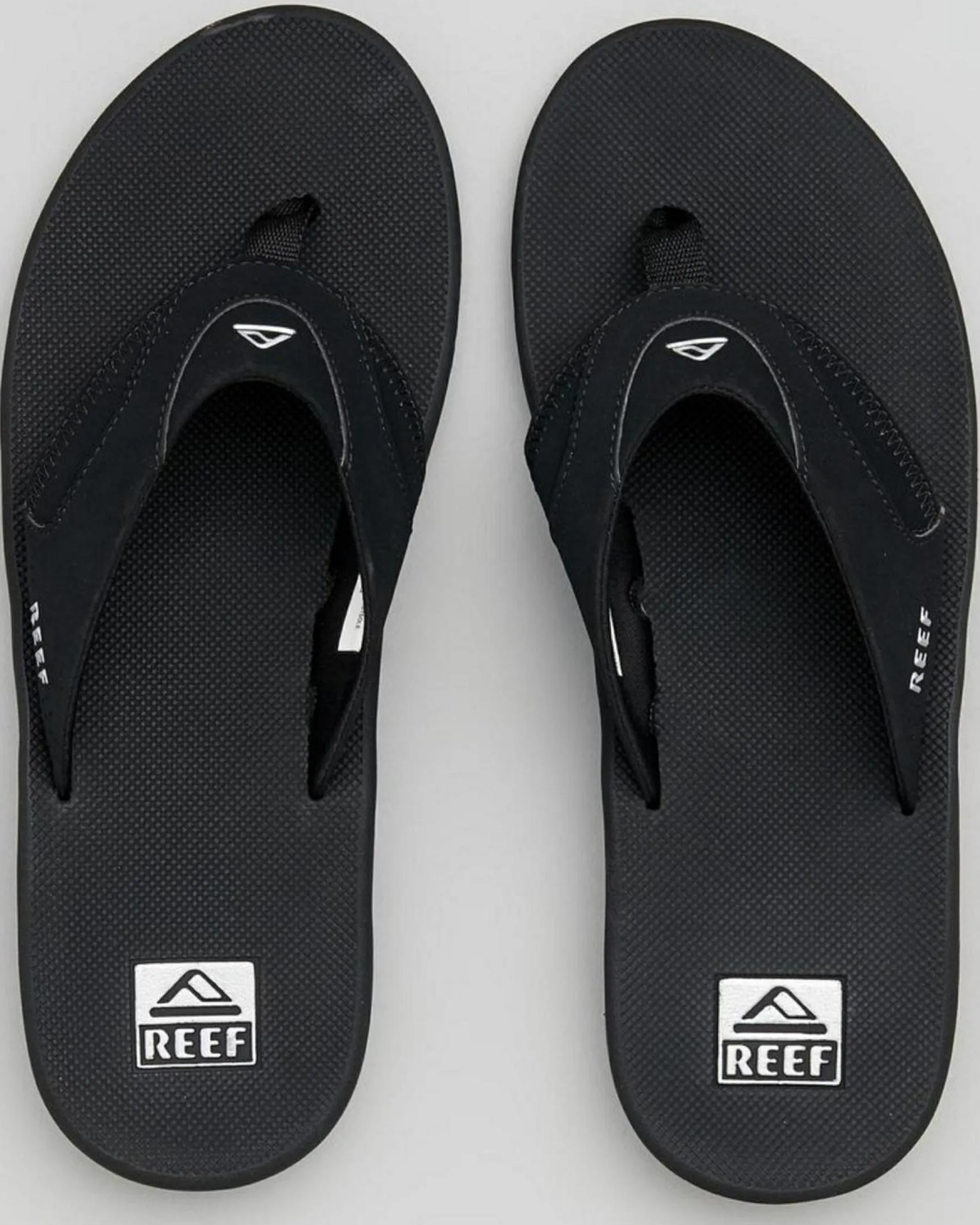Slides*Reef Fanning Thongs Black/silver